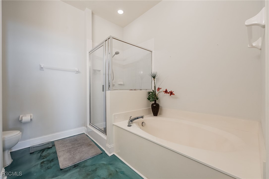 2743 First Street, Unit 304 Fort Myers, FL 33916 - Photo 25 of 50 a bathroom with a bathtub and a shower