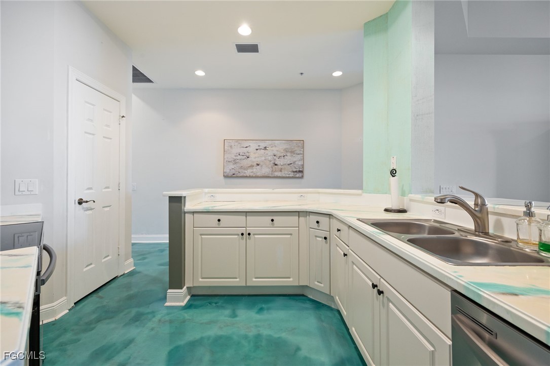 2743 First Street, Unit 304 Fort Myers, FL 33916 - Photo 6 of 50 a spacious bathroom with a sink and a mirror