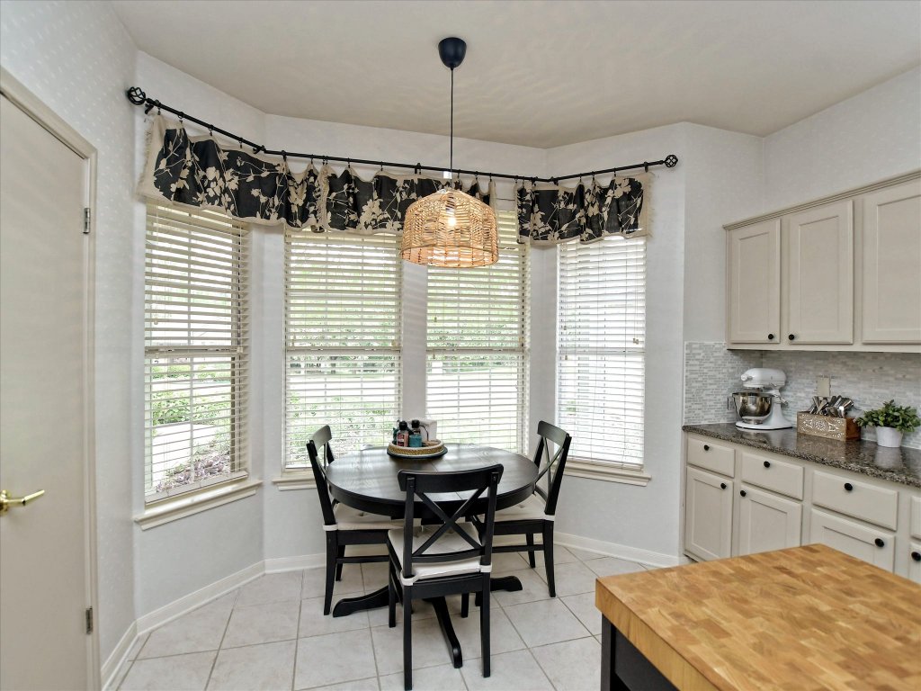 116 Running Water Street Georgetown, TX 78633 - Photo 13 of 25 a dining room with furniture and window