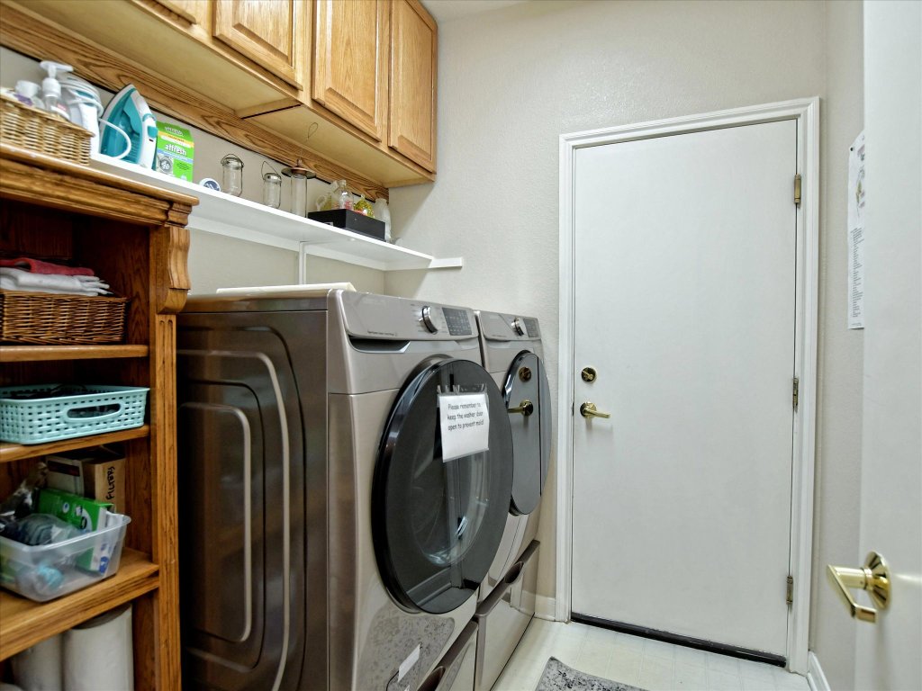 116 Running Water Street Georgetown, TX 78633 - Photo 14 of 25 a utility room with dryer and washer