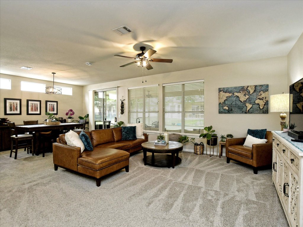 116 Running Water Street Georgetown, TX 78633 - Photo 7 of 25 a living room with furniture and a large window