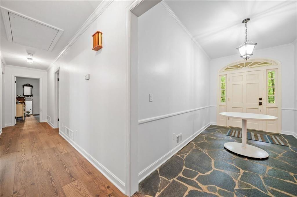 286 Hilton Way Canton, GA 30114 - Photo 6 of 59 a room with furniture and a table