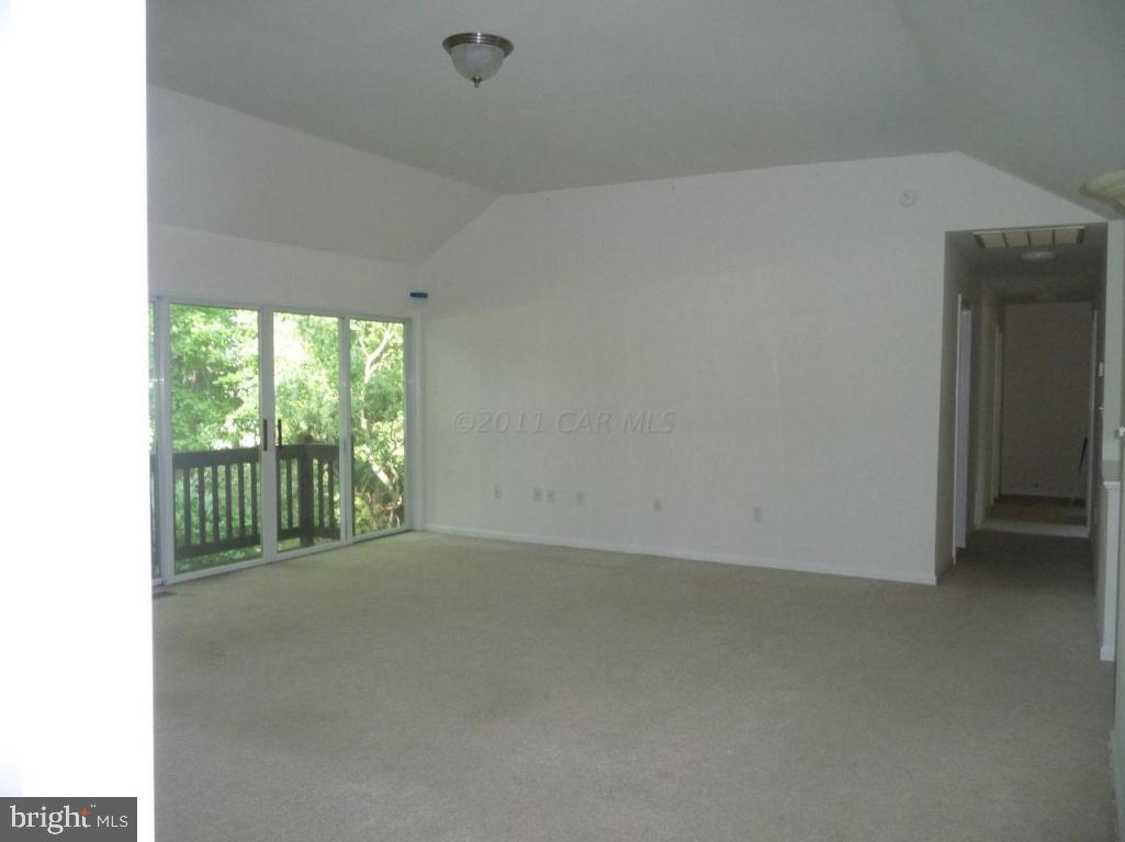 275 Windjammer Road Ocean Pines, MD 21811 - Photo 17 of 20 a view of a room with a floor to ceiling window