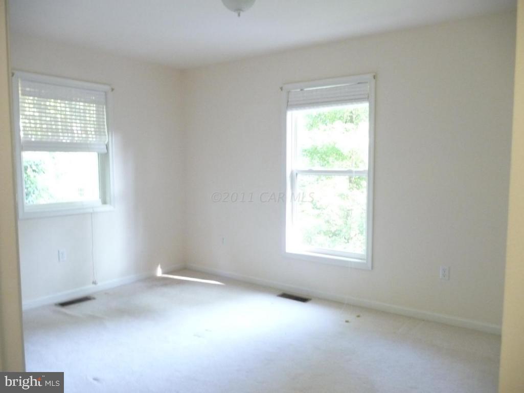 275 Windjammer Road Ocean Pines, MD 21811 - Photo 20 of 20 an empty room with a window