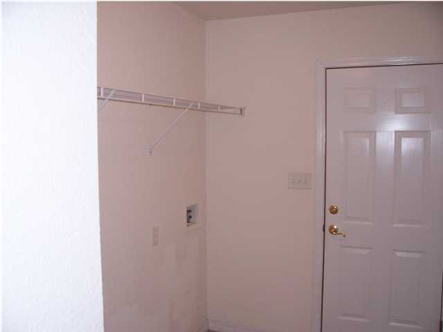 44 Shipwreck Road Santa Rosa Beach, FL 32459 - Photo 12 of 13 a bathroom with a glass shower door