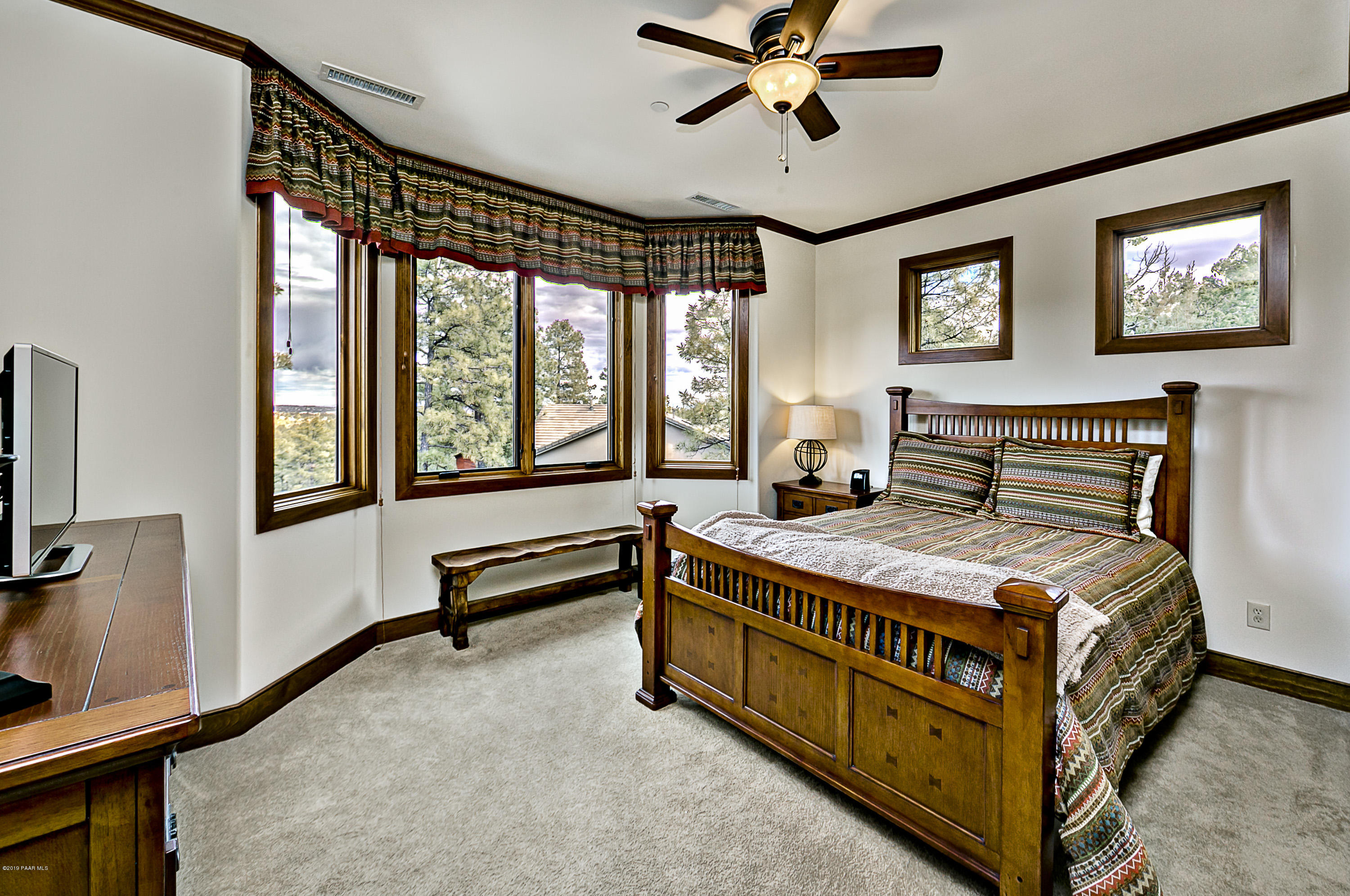 1340 East Valley View Road Prescott, AZ 86303 - Photo 18 of 33 a bedroom with a bed and a window