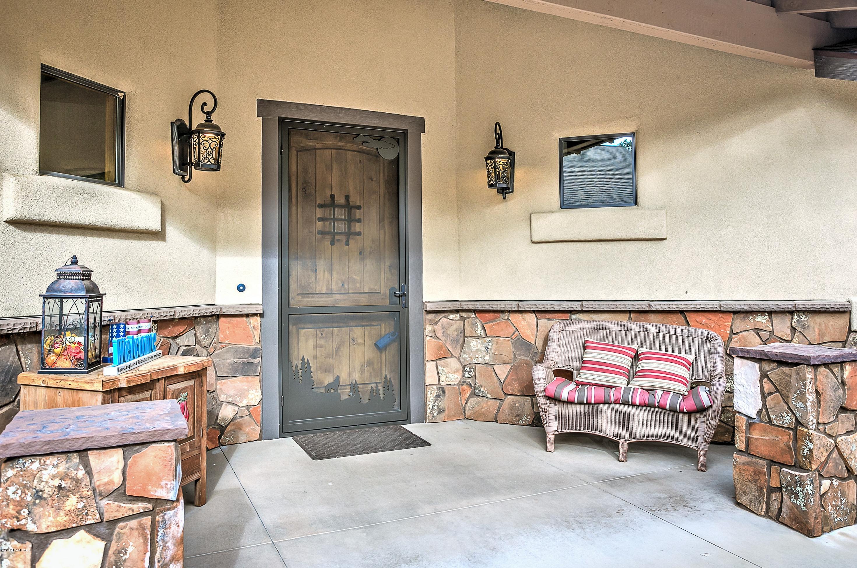1340 East Valley View Road Prescott, AZ 86303 - Photo 3 of 33 a bedroom with furniture and a window