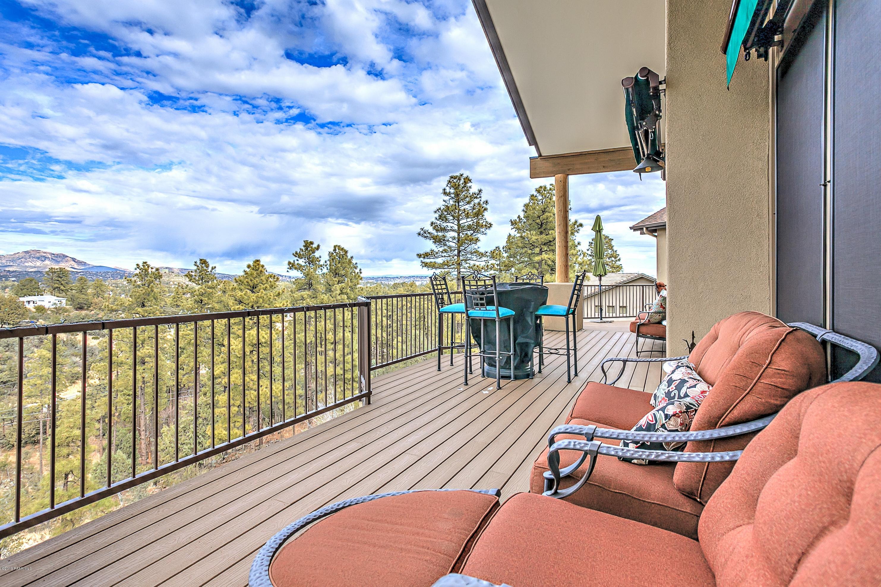 1340 East Valley View Road Prescott, AZ 86303 - Photo 32 of 33 a balcony with furniture and wooden floor