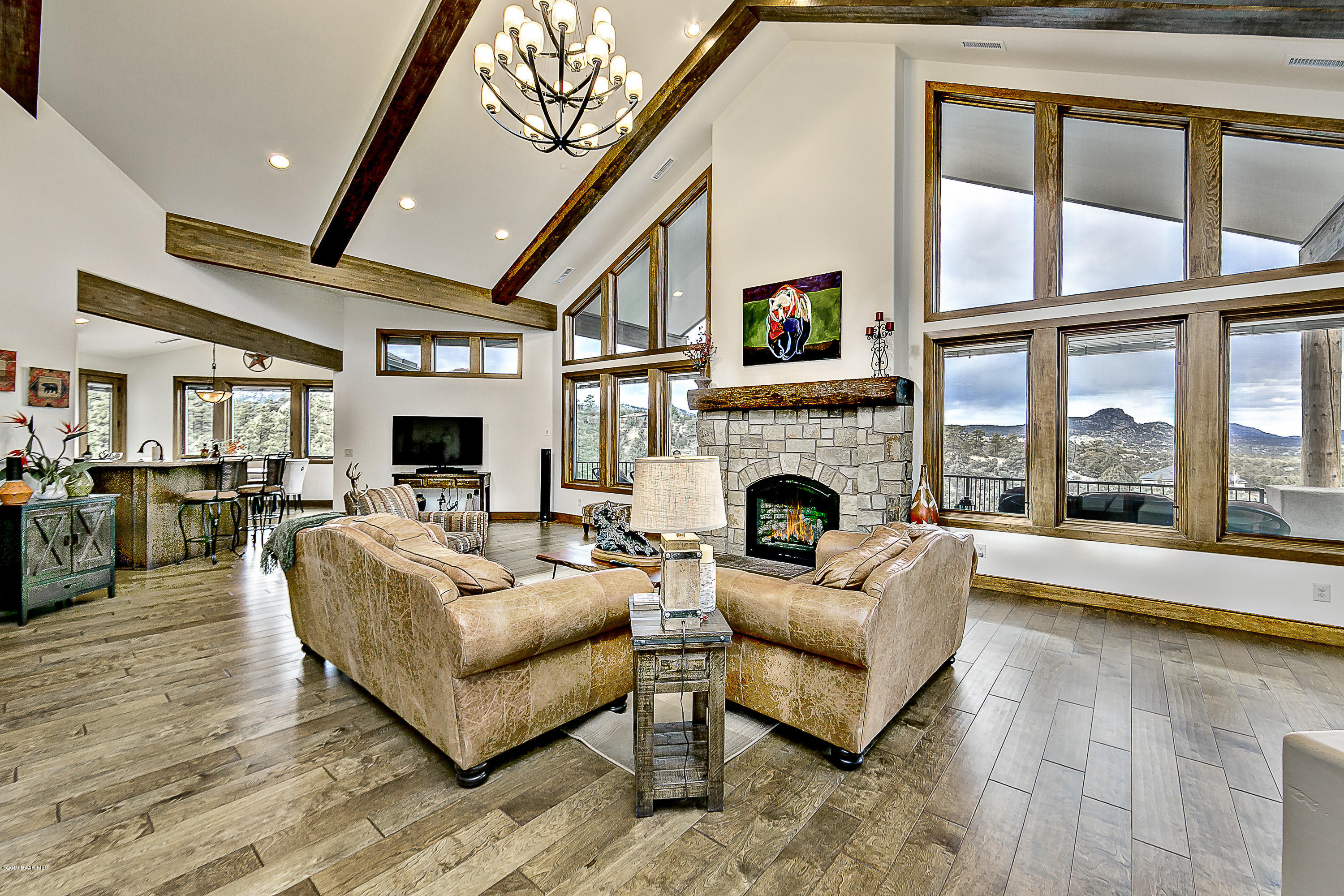 1340 East Valley View Road Prescott, AZ 86303 - Photo 6 of 33 a living room with furniture large window and a fireplace