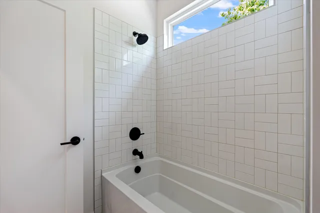 a bathroom with a tub