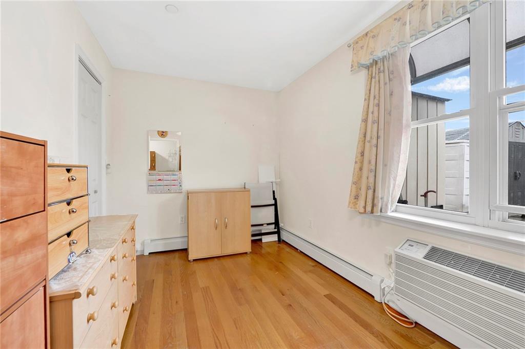 1270 Bay Ridge Parkway, Unit 6 Brooklyn, NY 11228 - Photo 18 of 24 wooden floor and windows in a room