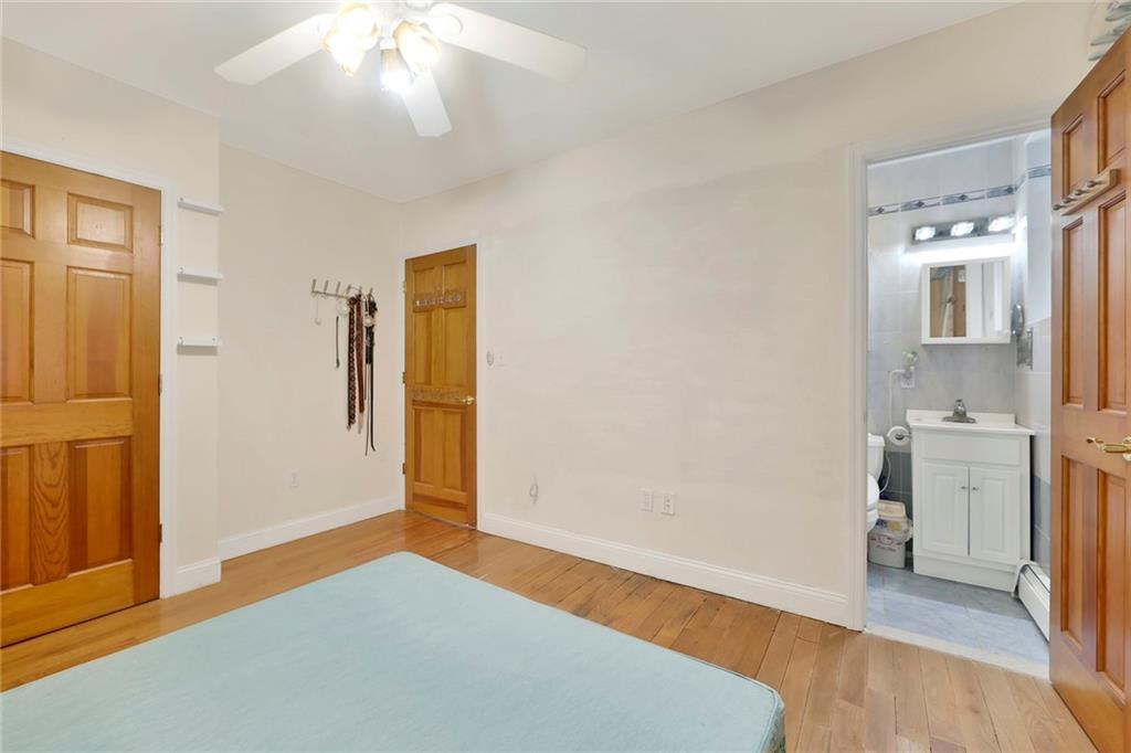 1270 Bay Ridge Parkway, Unit 6 Brooklyn, NY 11228 - Photo 20 of 24 an empty room with a bathroom and a sink