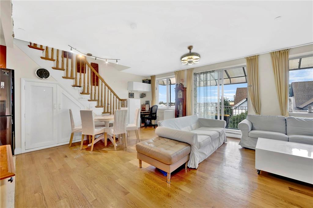 1270 Bay Ridge Parkway, Unit 6 Brooklyn, NY 11228 - Photo 4 of 24 a living room with furniture and wooden floor