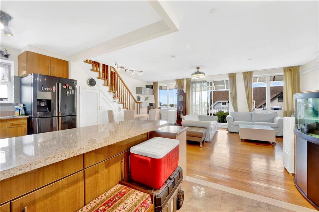 1270 Bay Ridge Parkway, Unit 6 Brooklyn, NY 11228 - Photo 10 of 24 a living room with furniture fireplace and wooden floor