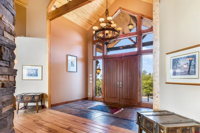 a view of a livingroom with furniture and wooden floor
