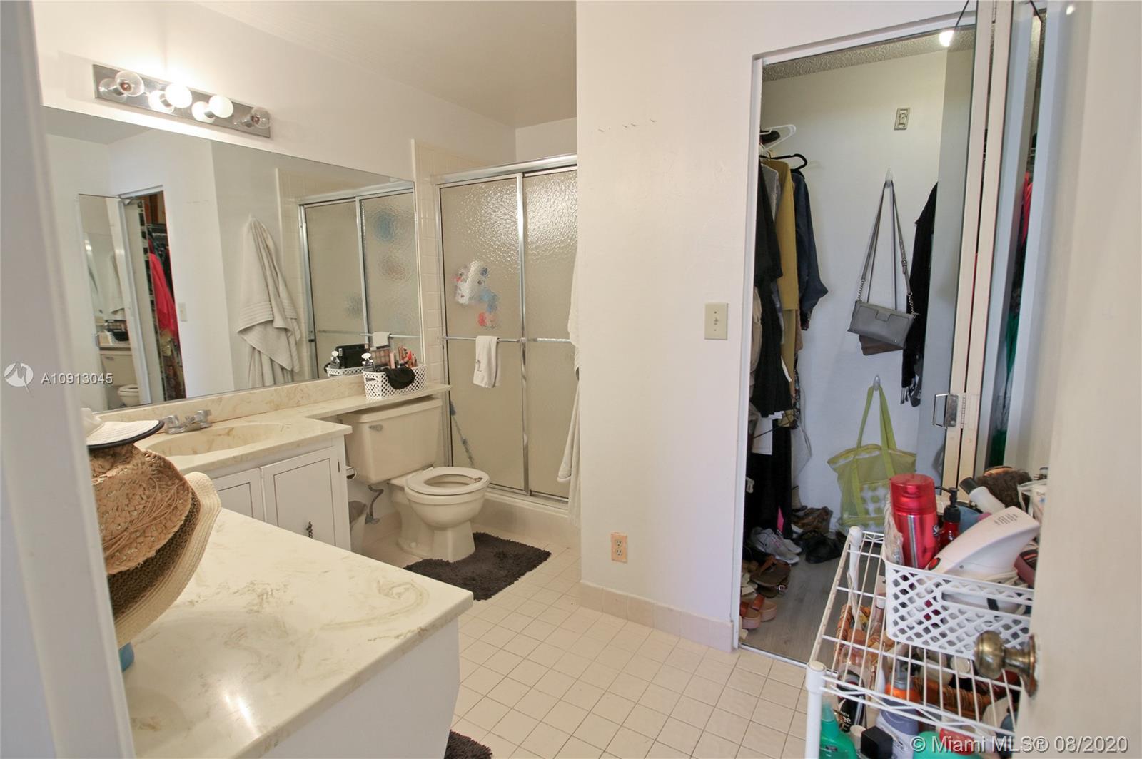 739 Banks Road Margate, FL 33063 - Photo 12 of 21 a bathroom with a sink toilet and shower