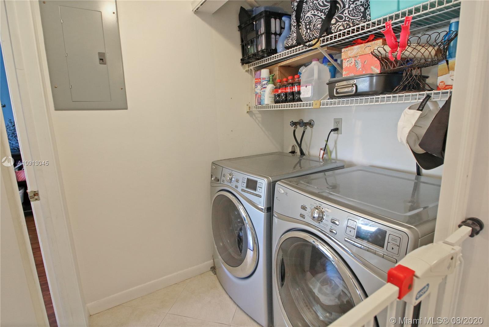 739 Banks Road Margate, FL 33063 - Photo 8 of 21 a utility room with dryer and washer