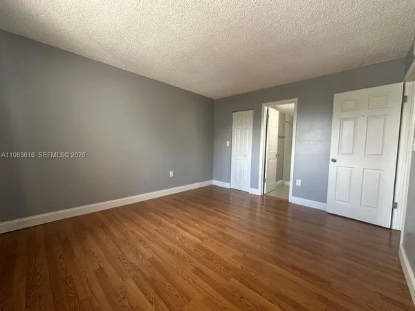 a view of an empty walk in closet