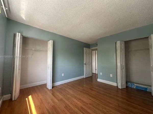 a bathroom with a sink and shower