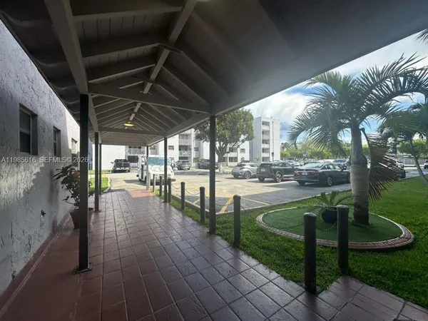 a view of swimming pool with outdoor seating