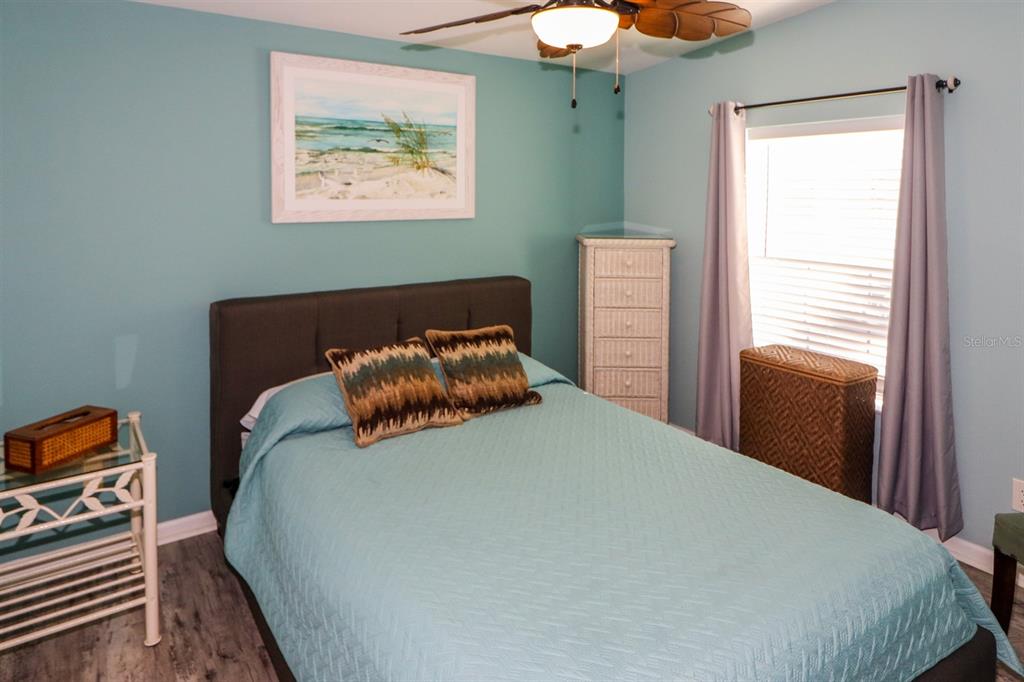 29200 South Jones Loop Road, Unit 522 Punta Gorda, FL 33950 - Photo 16 of 38 a bedroom with a bed and a window