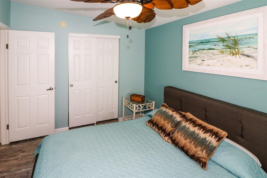 29200 South Jones Loop Road, Unit 522 Punta Gorda, FL 33950 - Photo 17 of 38 a bedroom with furniture and a window