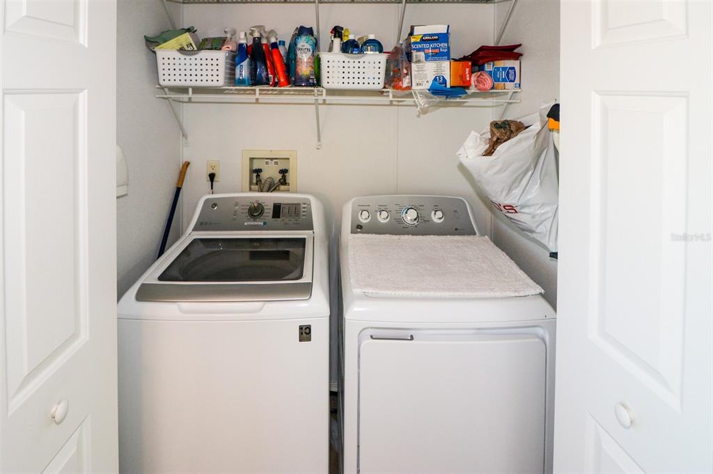 29200 South Jones Loop Road, Unit 522 Punta Gorda, FL 33950 - Photo 25 of 38 a utility room with dryer and washer