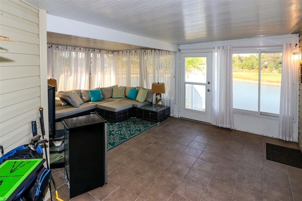 29200 South Jones Loop Road, Unit 522 Punta Gorda, FL 33950 - Photo 30 of 38 a living room with furniture and a window