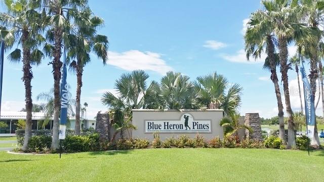 29200 South Jones Loop Road, Unit 522 Punta Gorda, FL 33950 - Photo 35 of 38 a sign that is on the side of a building