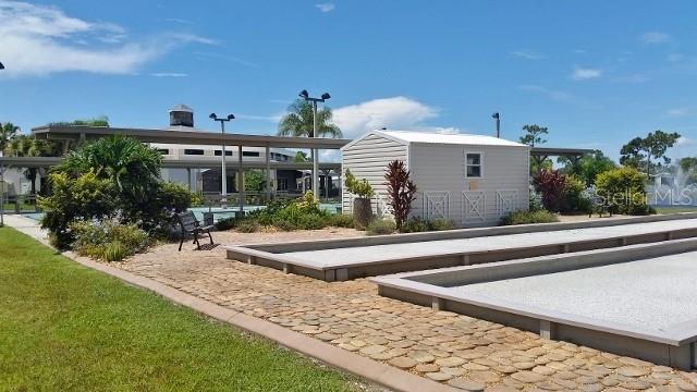 29200 South Jones Loop Road, Unit 522 Punta Gorda, FL 33950 - Photo 37 of 38 a view of a house and outdoor space