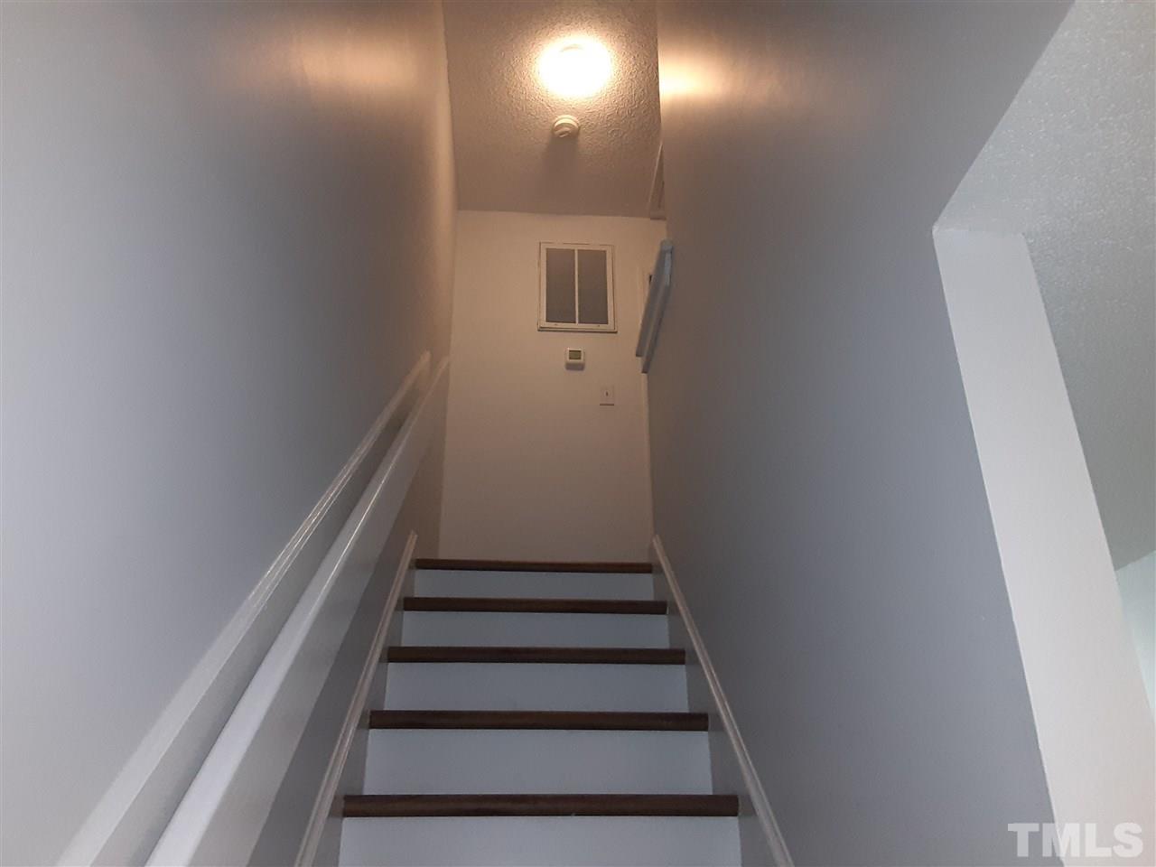 6788 Chauncey Drive Raleigh, NC 27615 - Photo 16 of 30 To upstairs