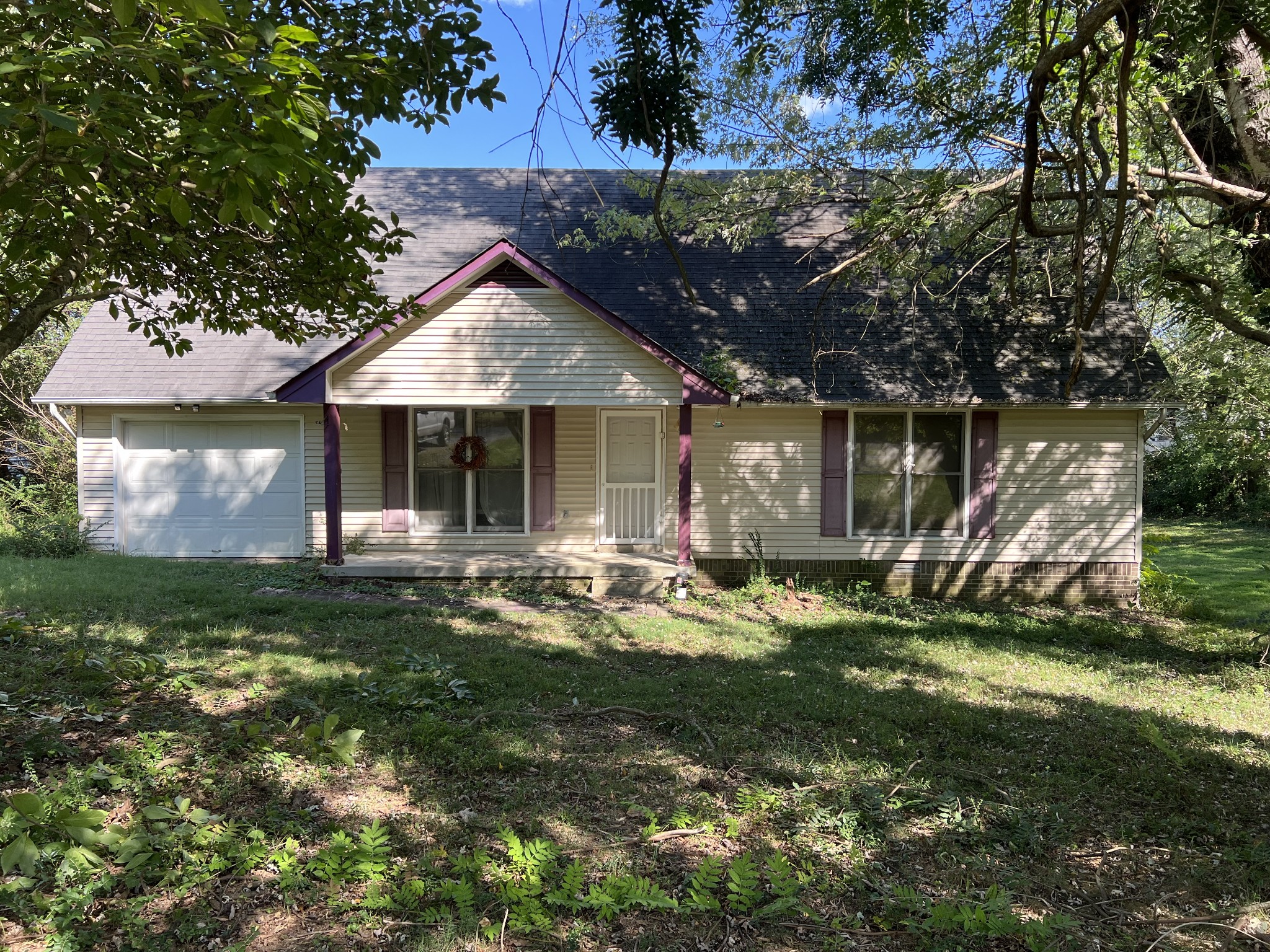 1161 Windsor Circle Lyles, TN 37098 - Photo 2 of 3 a backyard of a house with yard barbeque oven and outdoor seating