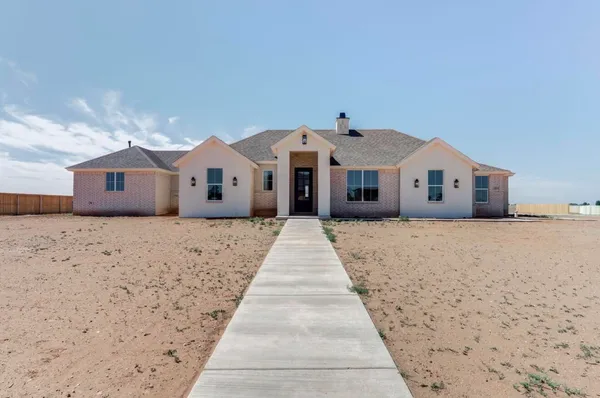 a front view of house with yard