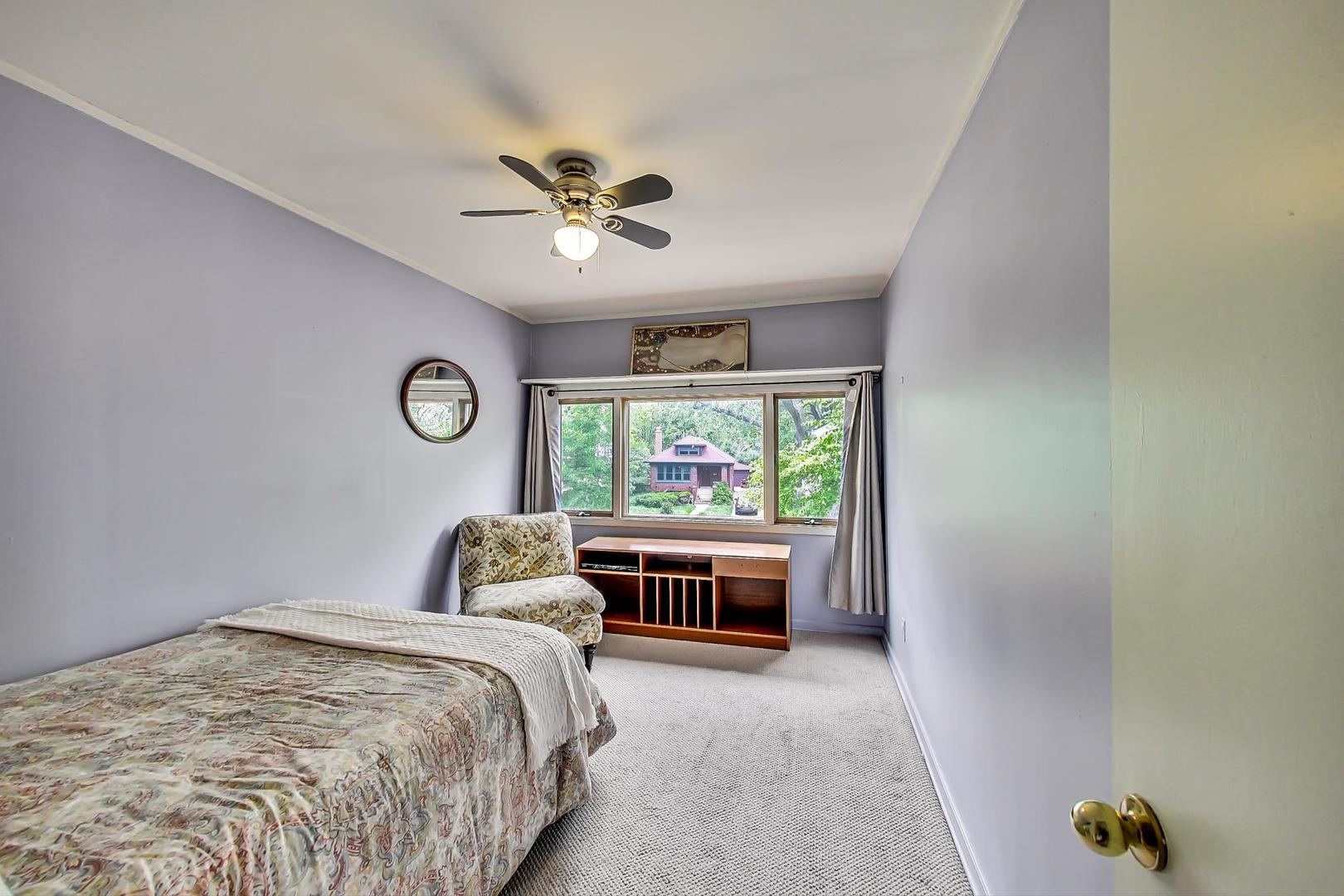 431 Selborne Road Riverside, IL 60546 - Photo 20 of 33 a bedroom with a bed and a window