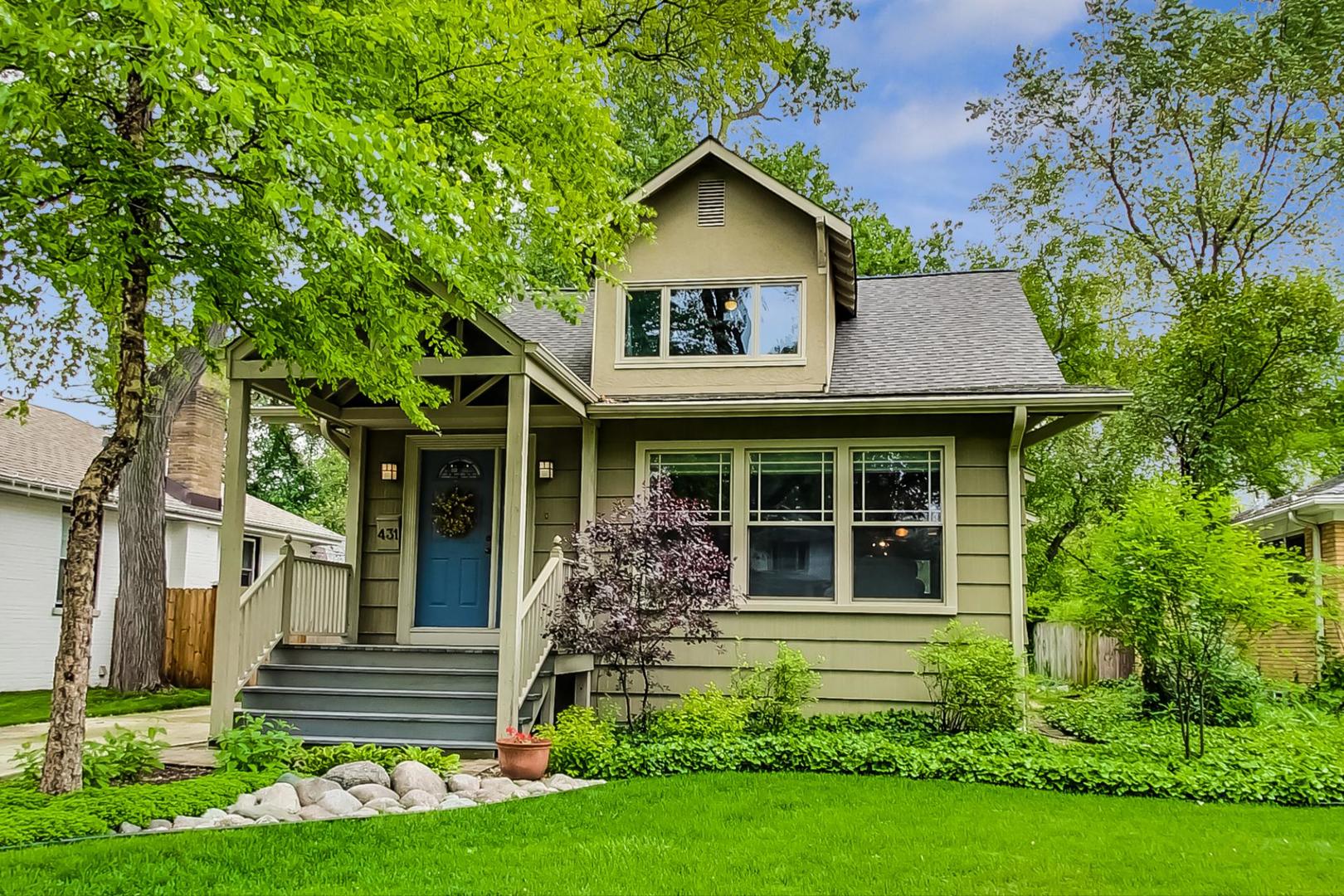 431 Selborne Road Riverside, IL 60546 - Photo 2 of 33 a front view of a house with a yard