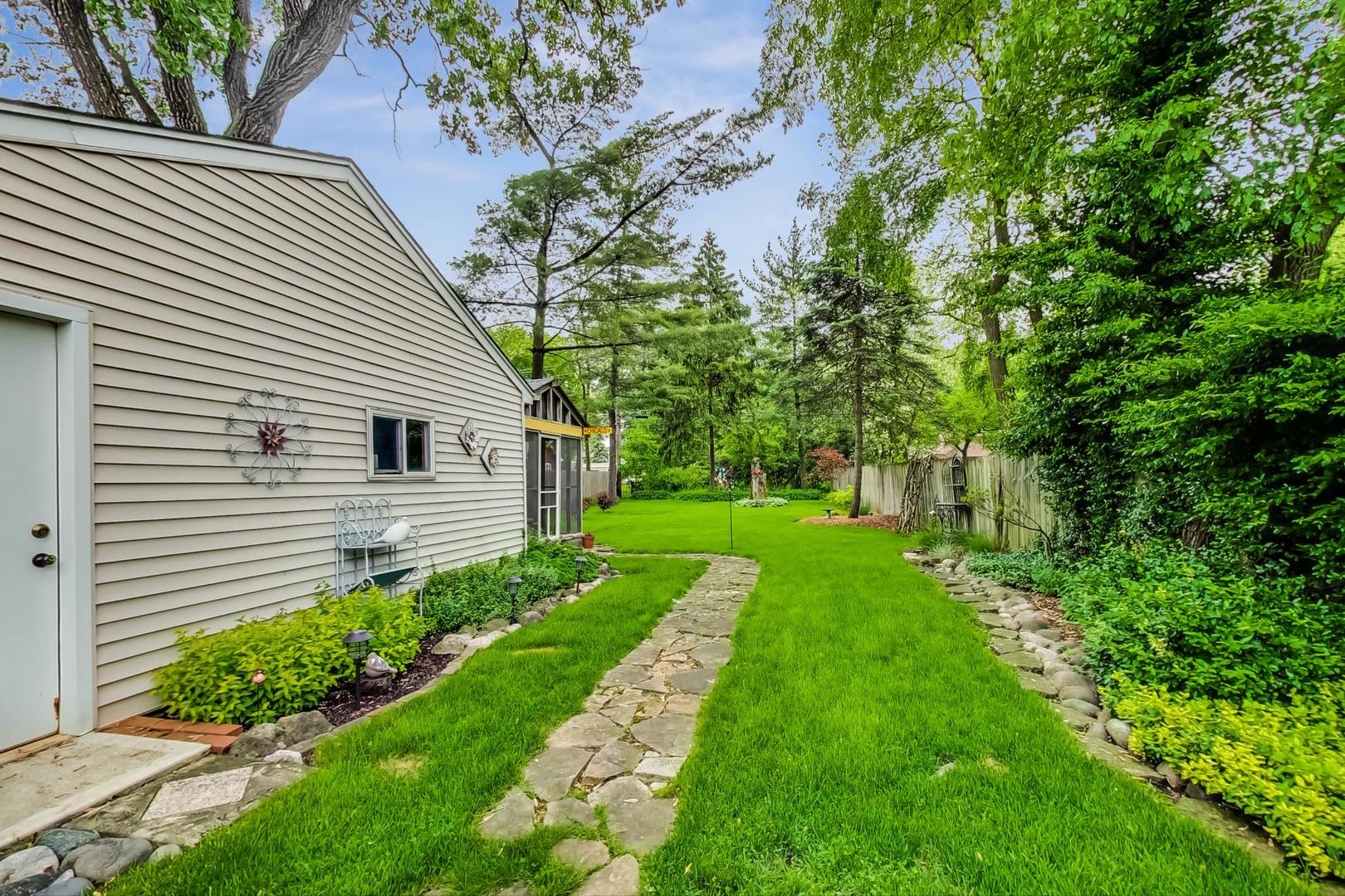 431 Selborne Road Riverside, IL 60546 - Photo 27 of 33 a front view of a house with a yard