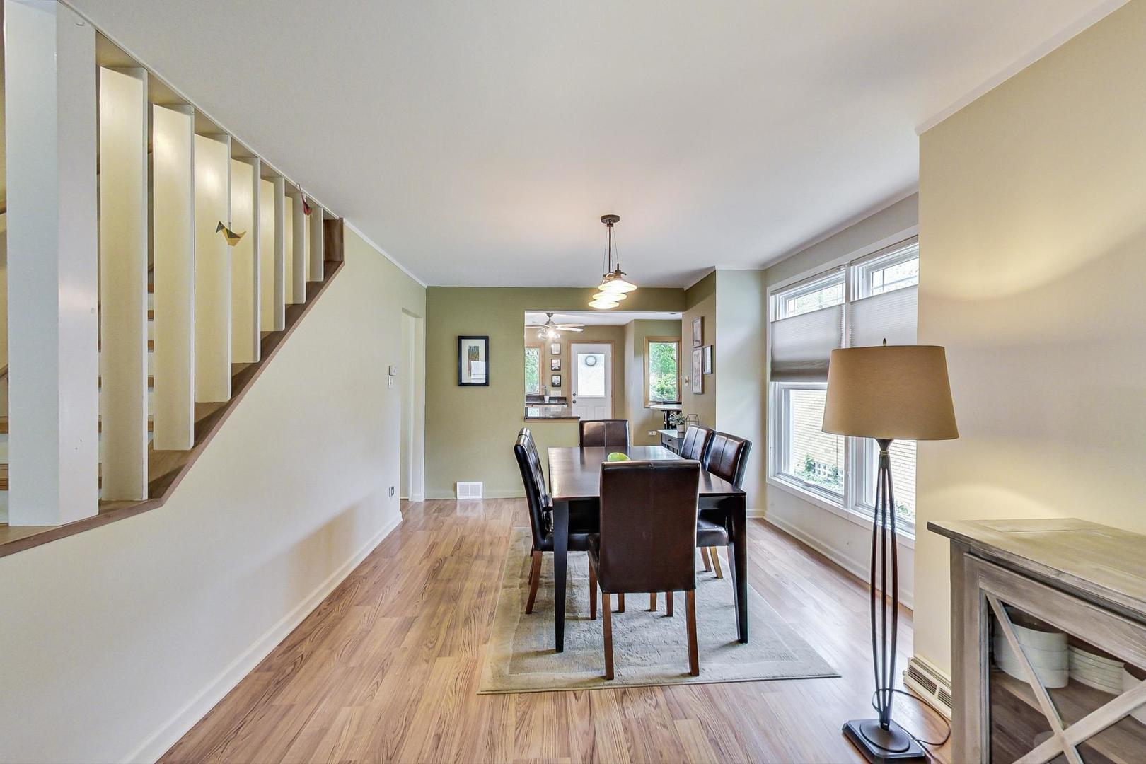 431 Selborne Road Riverside, IL 60546 - Photo 6 of 33 a view of a dining room with furniture window and wooden floor