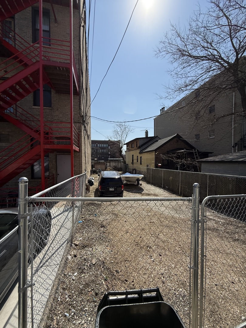 1420 West Division Street Chicago, IL 60642 - Photo 2 of 2 a view of car parked on road