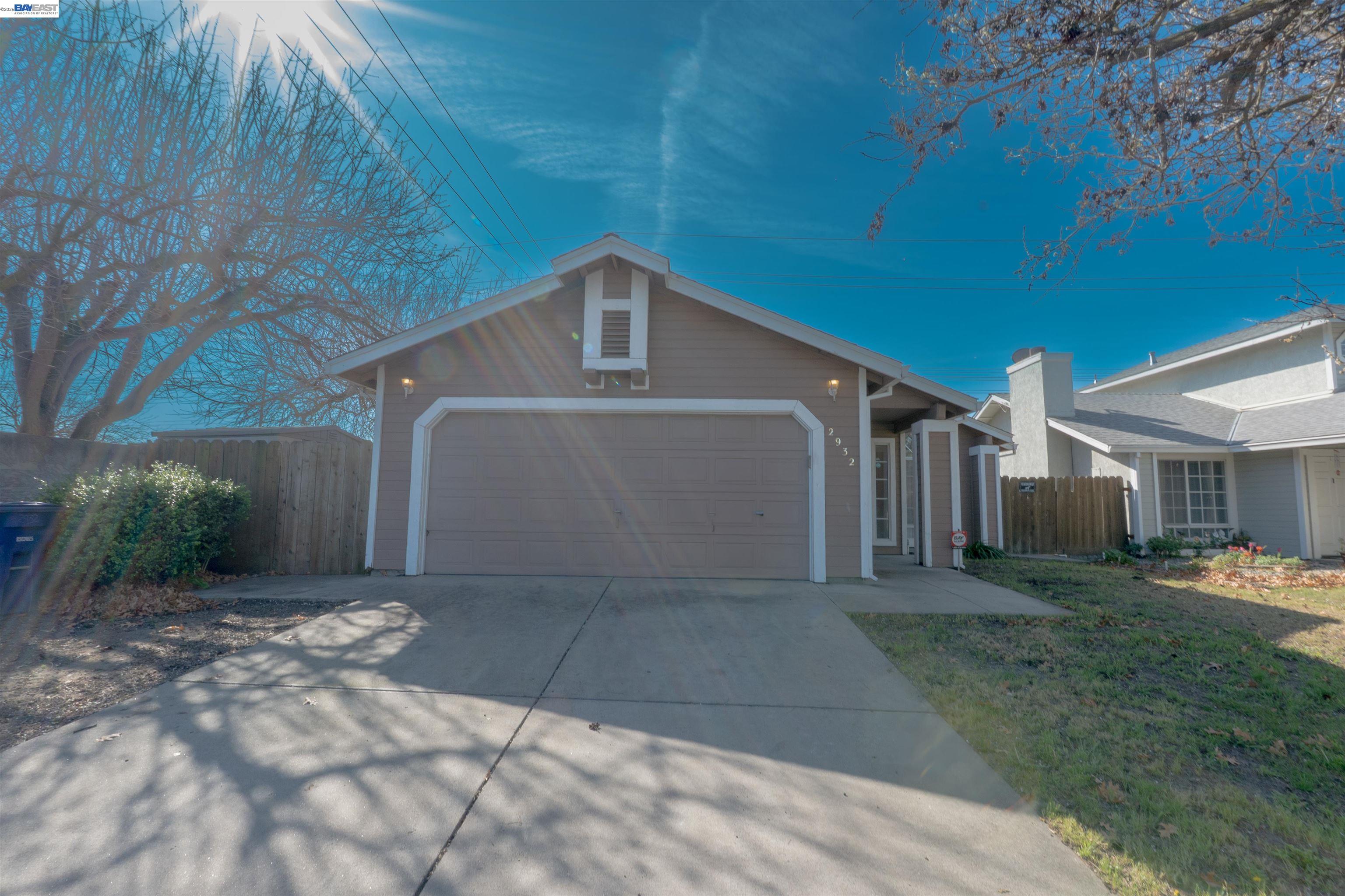2932 Alcott Court Modesto, CA 95355 - Photo 2 of 39 a view of a house with a yard