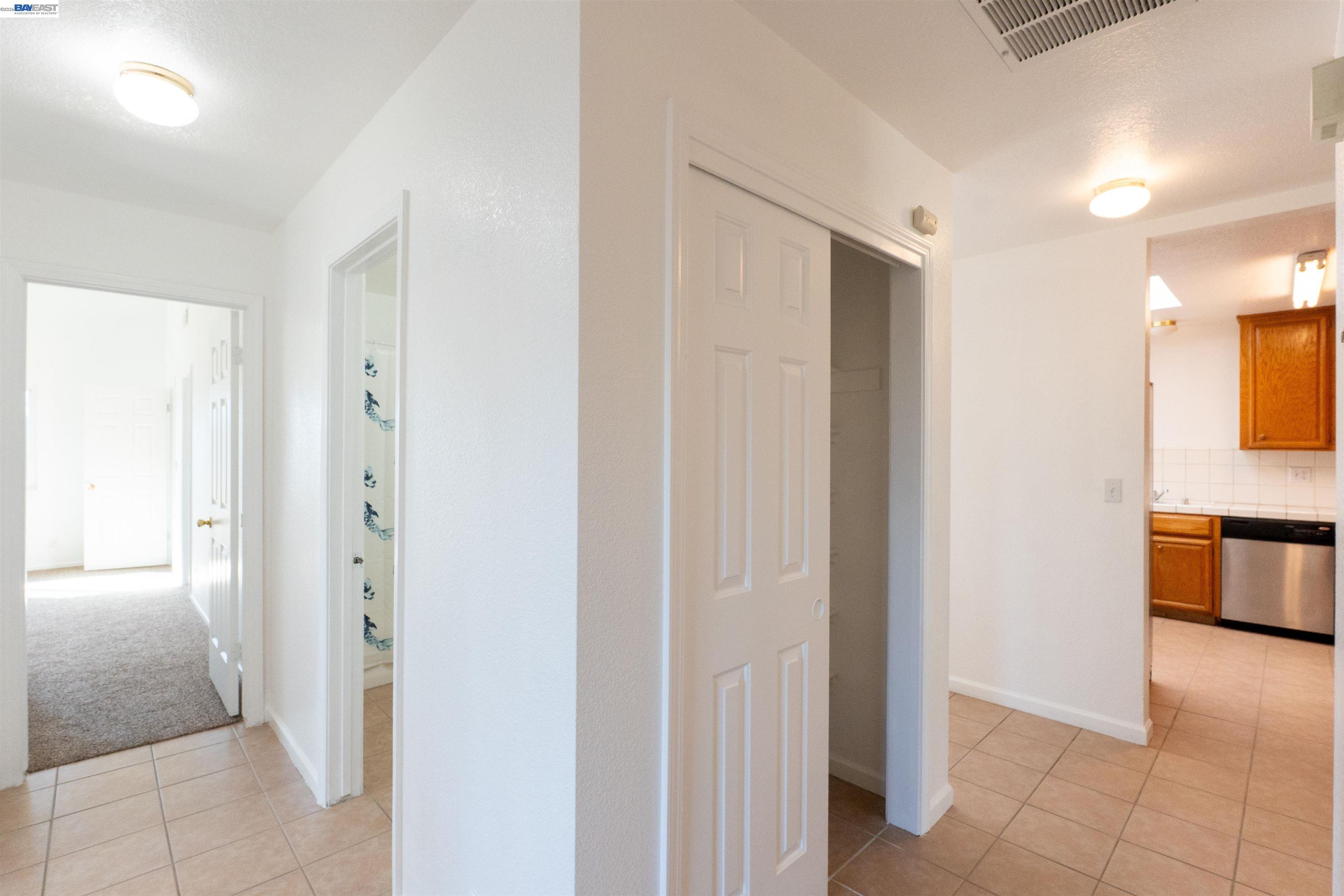 2932 Alcott Court Modesto, CA 95355 - Photo 21 of 39 a view of a bathroom from the hallway
