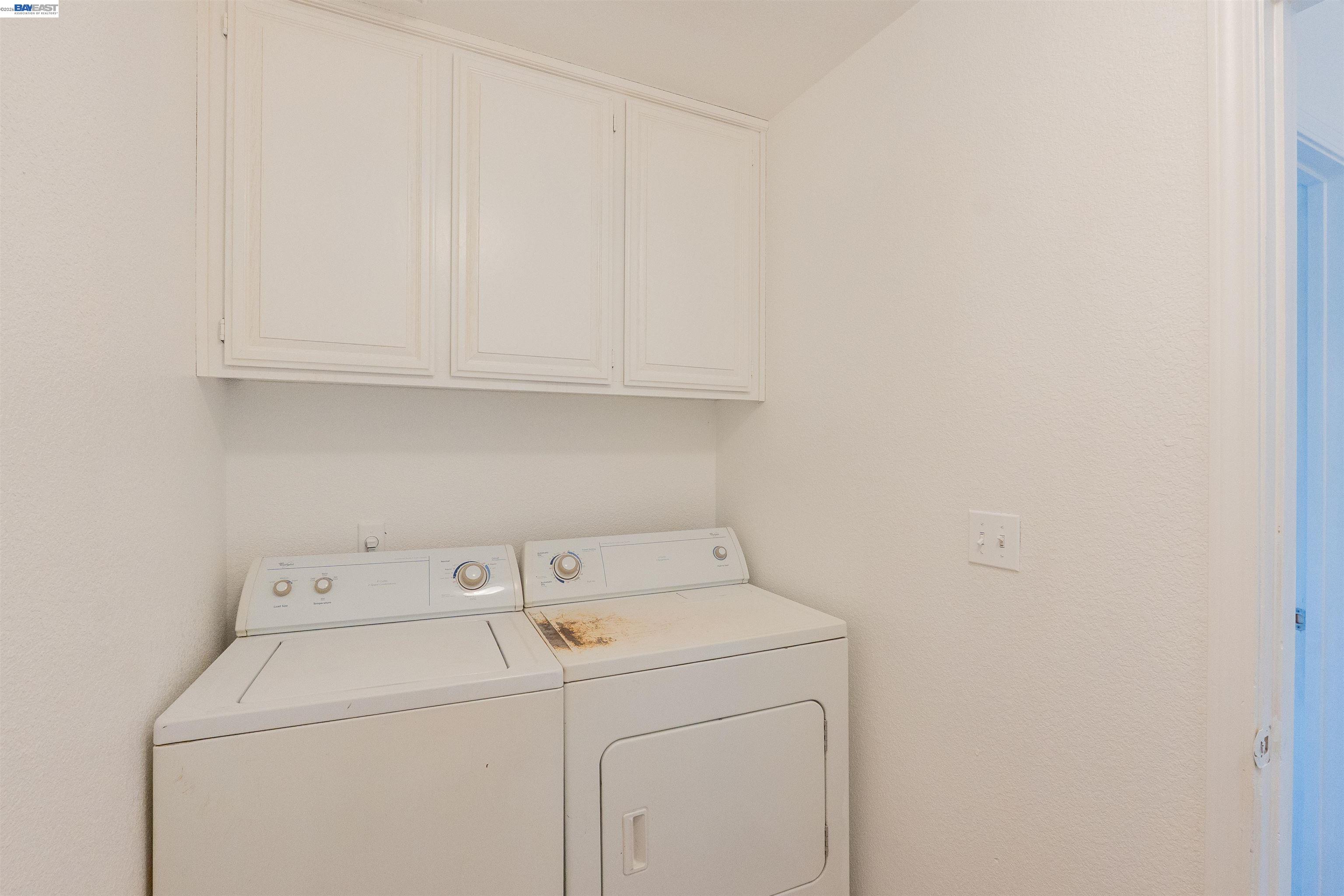 2932 Alcott Court Modesto, CA 95355 - Photo 22 of 39 a utility room with dryer and washer