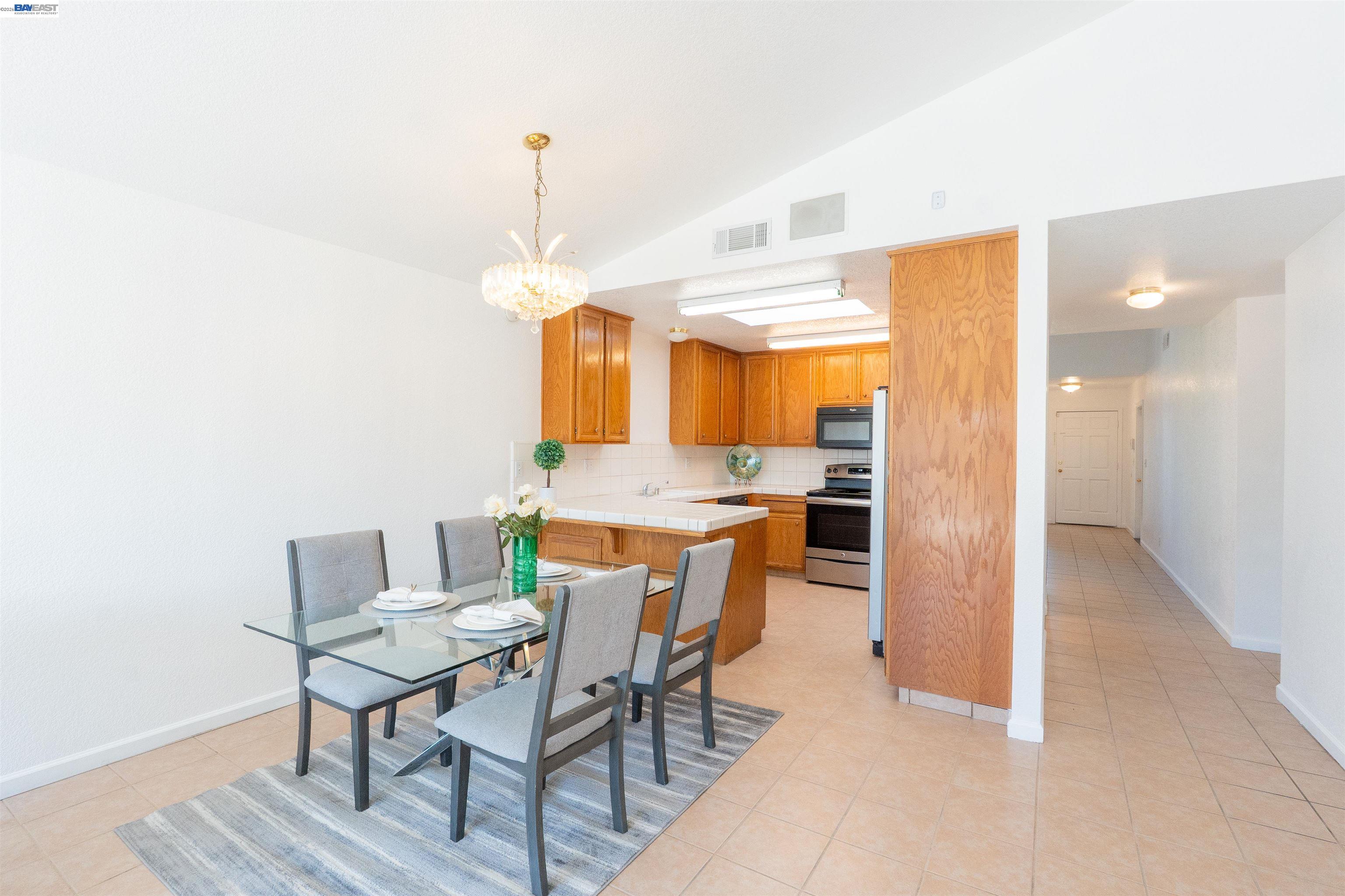 2932 Alcott Court Modesto, CA 95355 - Photo 34 of 39 a view of a dining room with furniture
