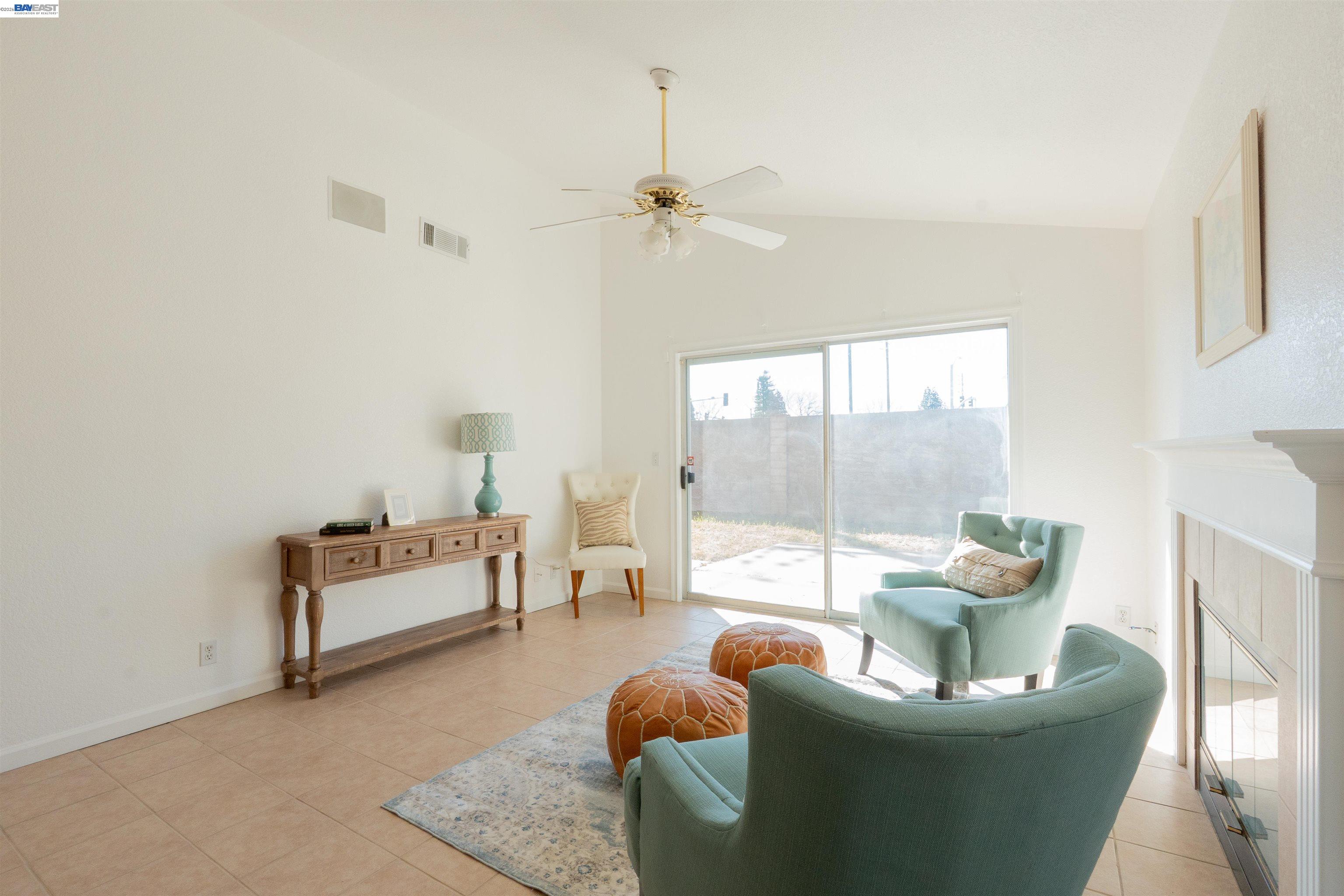 2932 Alcott Court Modesto, CA 95355 - Photo 35 of 39 a living room with furniture and a large window