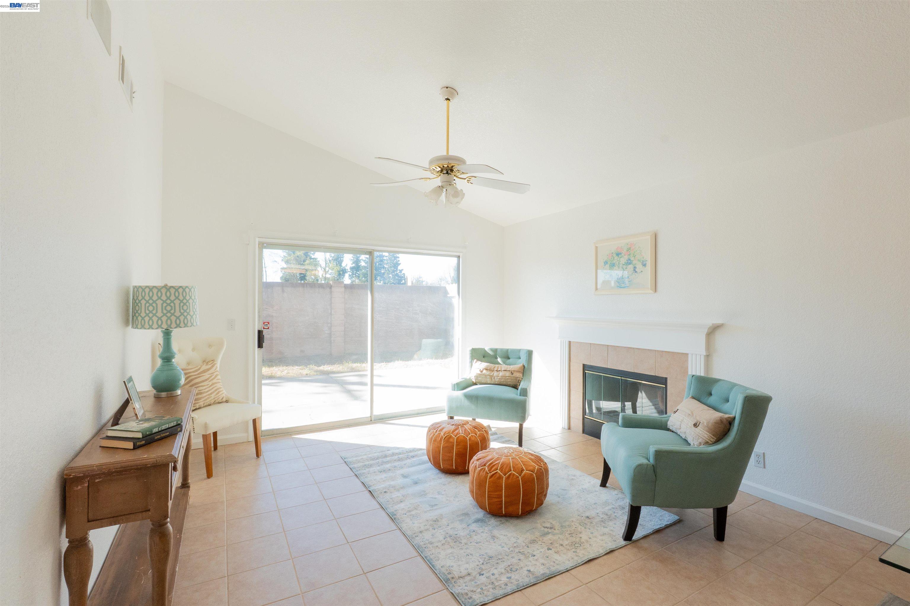 2932 Alcott Court Modesto, CA 95355 - Photo 36 of 39 a living room with furniture and a table