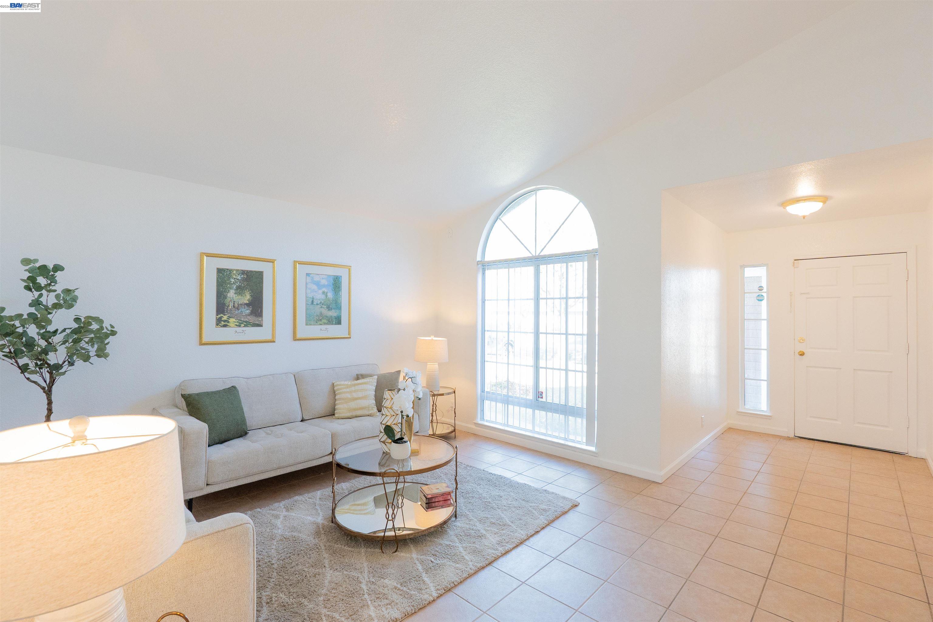 2932 Alcott Court Modesto, CA 95355 - Photo 38 of 39 a living room with furniture and a window