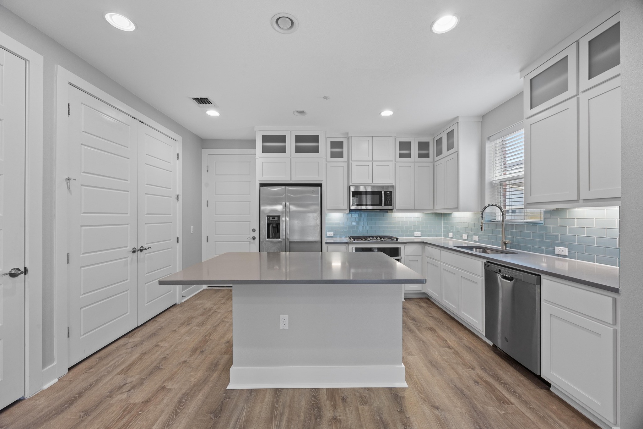2222 Simond Avenue, Unit E Austin, TX 78723 - Photo 7 of 28 Ample storage and food prep area in this kitchn.