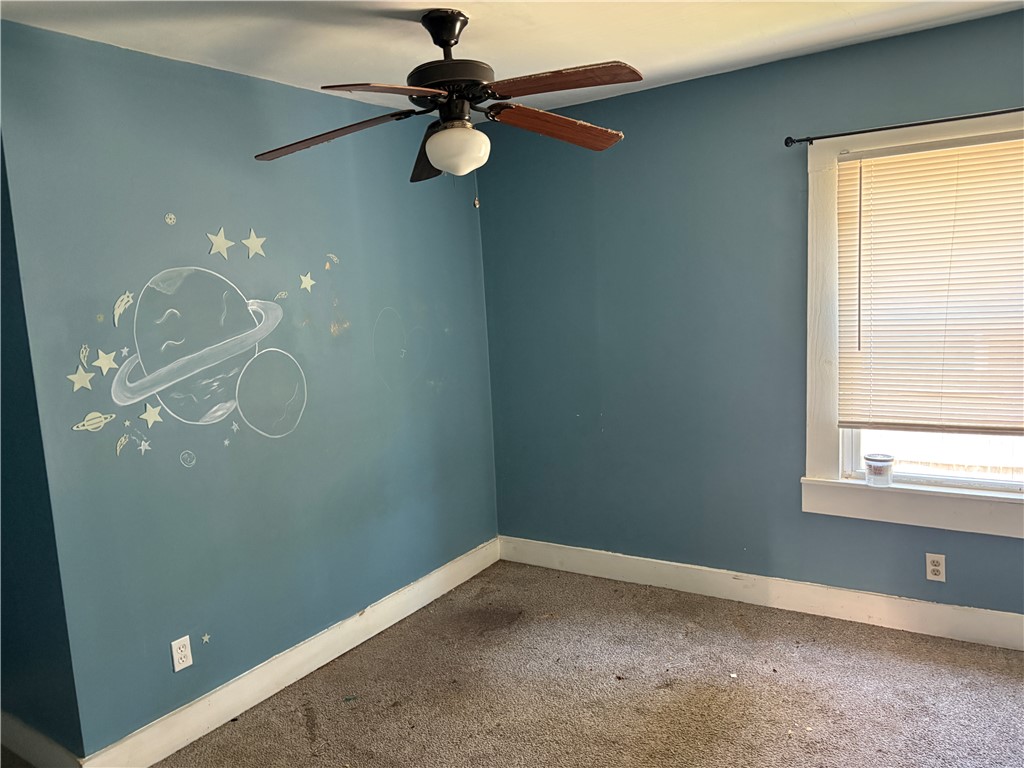 1309 Gilmer Street Anderson, SC 29621 - Photo 13 of 15 This cozy bedroom offers a versatile space, ready for your personal touches.