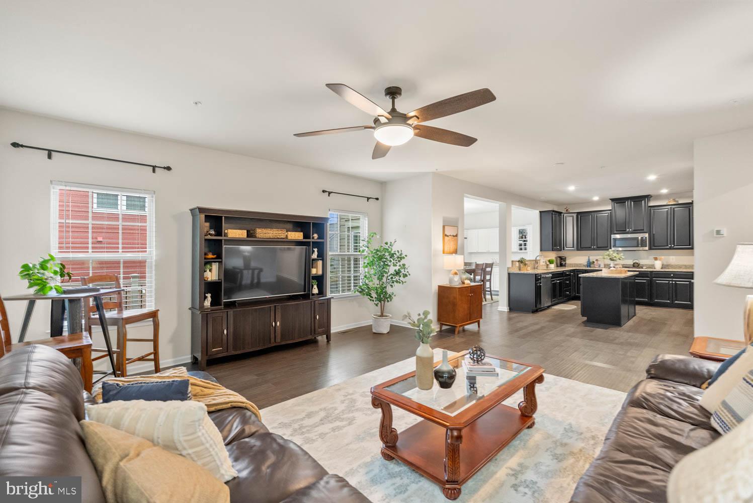 17883 Sugarberry Road Dumfries, VA 22026 - Photo 14 of 53 a living room with furniture kitchen view and a window