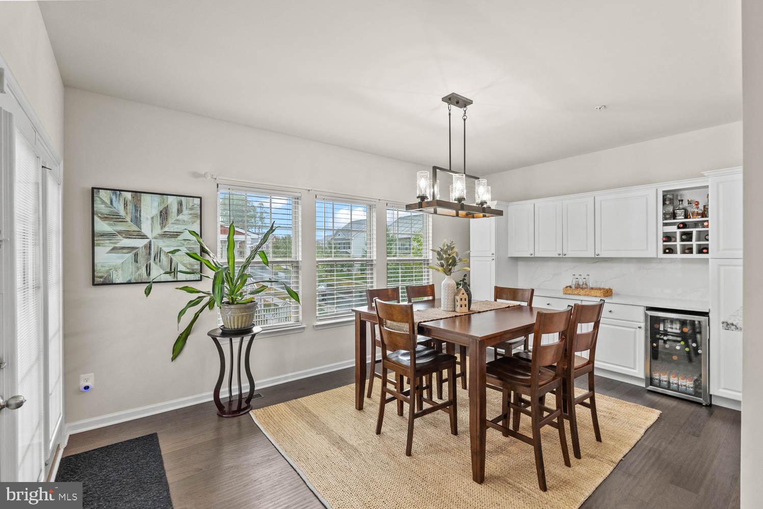17883 Sugarberry Road Dumfries, VA 22026 - Photo 21 of 53 a view of a dining room with furniture window and outside view