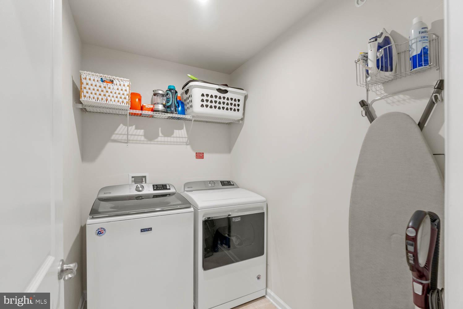 17883 Sugarberry Road Dumfries, VA 22026 - Photo 43 of 53 a utility room with dryer and washer